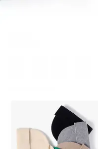 Detailed view of ribbed knit beanies in black, grey, beige and green with soft texture