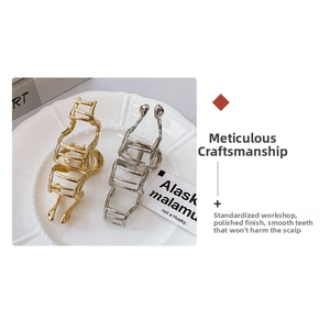 Close-up of polished gold and silver metal wave hair claws with smooth hollow structure