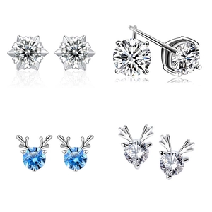 Set of four S925 silver stud earrings with snowflake, round diamond, and reindeer designs