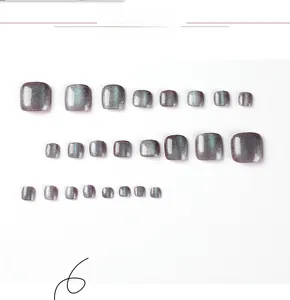 Detailed set of grey cat-eye glitter press-on toe nails in various sizes with high gloss
