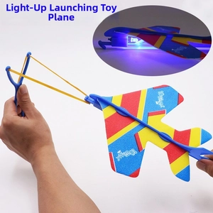 Detail showing the LED slingshot glider plane with launcher and elastic rubber band