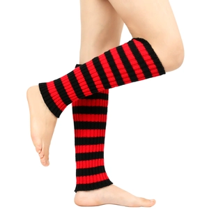 Detail of red and black striped knitted leg warmers showing the ribbed cuff texture