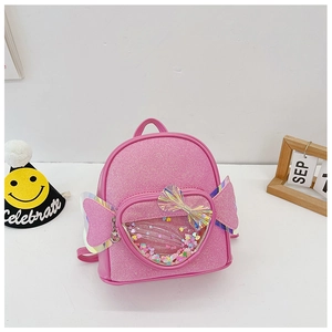 Pink sequin mini backpack with wing design and transparent heart-shaped liquid glitter pocket