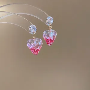Pink resin strawberry earrings with sparkling zircons and gold hooks for women