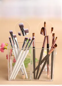 Detail of soft synthetic fiber bristles on small eye makeup brushes in a storage case