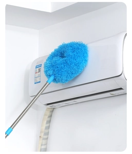 Blue microfiber ceiling fan duster with telescopic pole cleaning dust off an air conditioner