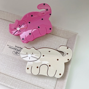 Set of cute acetate cat hair claws in pink and white with polka dots for women