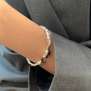Silver rose vine open cuff bracelet for women featuring an elegant vintage floral design