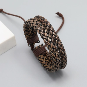 Retro woven leather bracelet for men featuring a brown layered texture and adjustable cord