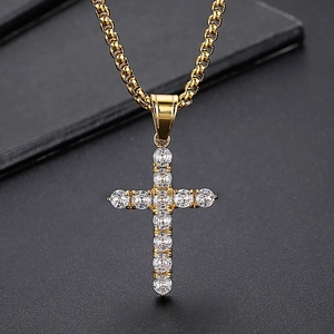 Hip hop gold cross pendant necklace with sparkling cubic zirconia on a box chain