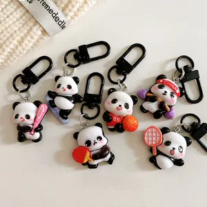Close-up of cute panda sports keychains featuring baseball, surfing, and basketball themes