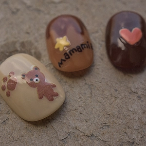 5D cute bear nail stickers with brown heart and star patterns on earth tone base