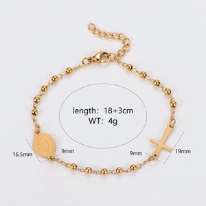 Polished gold stainless steel beaded bracelet with religious cross and medallion charms