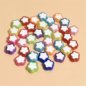 Macro shot of 10mm colorful five-petal flower resin beads for DIY bracelet jewelry making