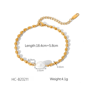 Detailed view of gold stainless steel pearl bracelet with lobster clasp and length metrics