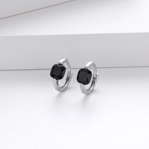 Detailed shot of S925 silver hoop earrings with square-cut black zircon stone inlay