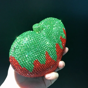 Red strawberry heart-shaped evening clutch bag with sparkling crystals and metal frame