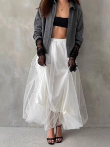 Elegant white layered tulle and satin maxi skirt with high waist for a chic look