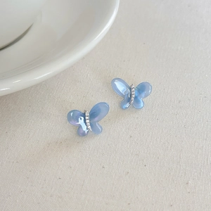 French vintage butterfly earrings with blue translucent wings and silver needle accents