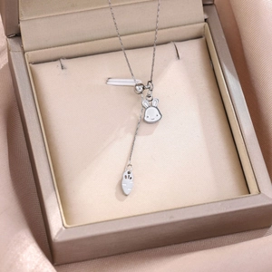 Silver stainless steel rabbit necklace with carrot pendant in a luxury jewelry box