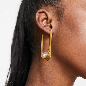 Elegant 18k gold plated stainless steel U-shaped earrings with white pearl detail