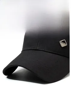 Detailed macro view of black baseball cap side with silver metal fashion plate