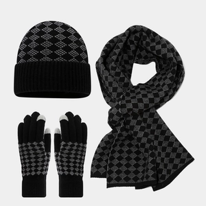 Close-up of knit winter set with diamond pattern and touch-screen glove fingertips
