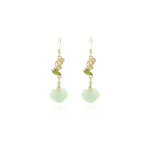 Detail of Chinese style fan-shaped bamboo leaf earrings with gold finish and green pendant