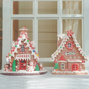 Illuminated clay gingerbread house Christmas ornaments with snowman and gingerbread man