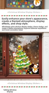 Close-up of Santa Claus, Christmas tree and snowman static decals on a glass door
