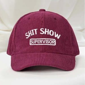 Classic burgundy corduroy baseball cap with white Shit Show Supervisor embroidery
