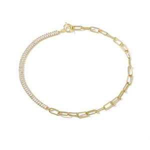 Close-up of golden T-bar necklace with zircon pavé links and sleek long link chain