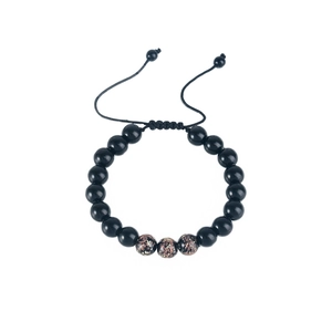 Close-up of beaded bracelet with black stones, glitter accents and adjustable cord