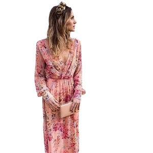 Close-up of pink floral print long sleeve maxi dress with V-neck and waist tie detail