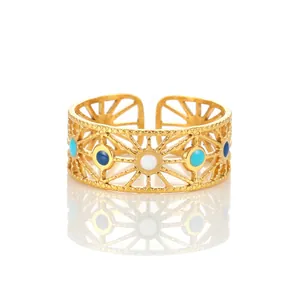 Detail view of adjustable gold-plated stainless steel ring with colorful enamel inlay