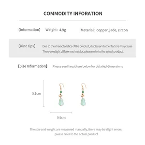 Detailed view showing dimensions of lotus fan earrings with jade and zircon butterfly tassels