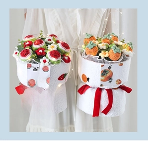 Close-up of handmade crochet sunflower fruit bouquet with LED lights and red velvet bow