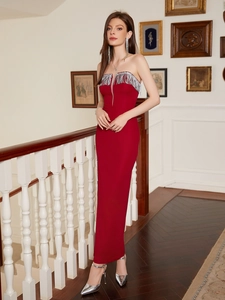 Elegant strapless wine red evening gown with silver fringe detail and high slit fit