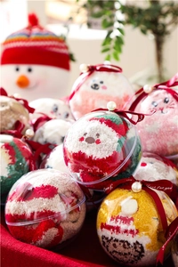Christmas gift socks in festive sphere packaging with Santa and reindeer patterns