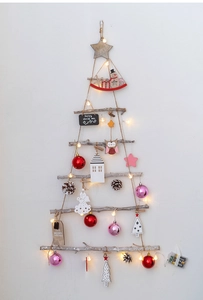 Wall-hanging wooden Christmas tree with LED lights, pine cones and festive ornaments