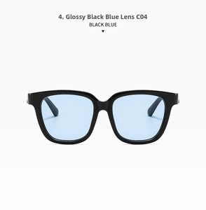 Detail view of square black sunglasses frame with light blue translucent lenses