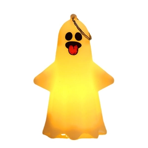 Glowing yellow Halloween ghost pumpkin lantern ornament with hanging ring on white background