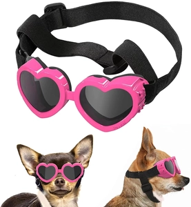 Pink heart-shaped pet goggles with adjustable elastic straps and dark lenses for small dogs
