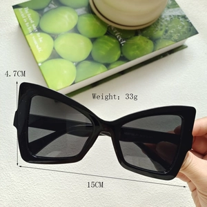 Detailed view of black cat-eye glasses frame with precise dimensions and weight specs
