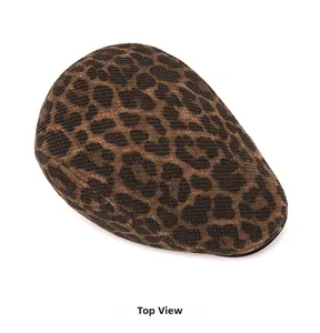 Top view of vintage leopard print flat cap with warm knitted texture for winter