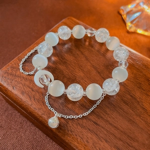 Vintage moonstone beaded bracelet with silver moon and bell charms for women
