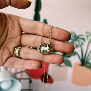 Gold plated stainless steel rabbit tarot necklace with colorful enamel pendant detail