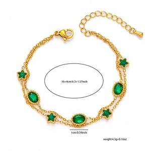 Detail of 18K gold-plated double-layer chain bracelet with green gemstones and lobster clasp