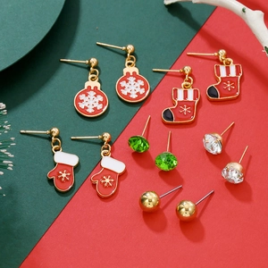 Detail of 6-pair Christmas stud earrings set featuring snowflake, sock and glove motifs