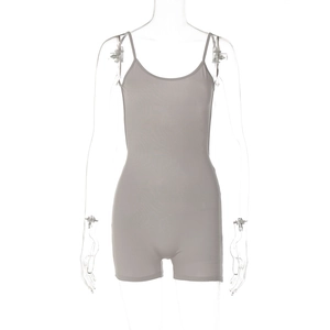 Detailed view of grey slim fit backless bodysuit with thin straps and ruched fabric texture
